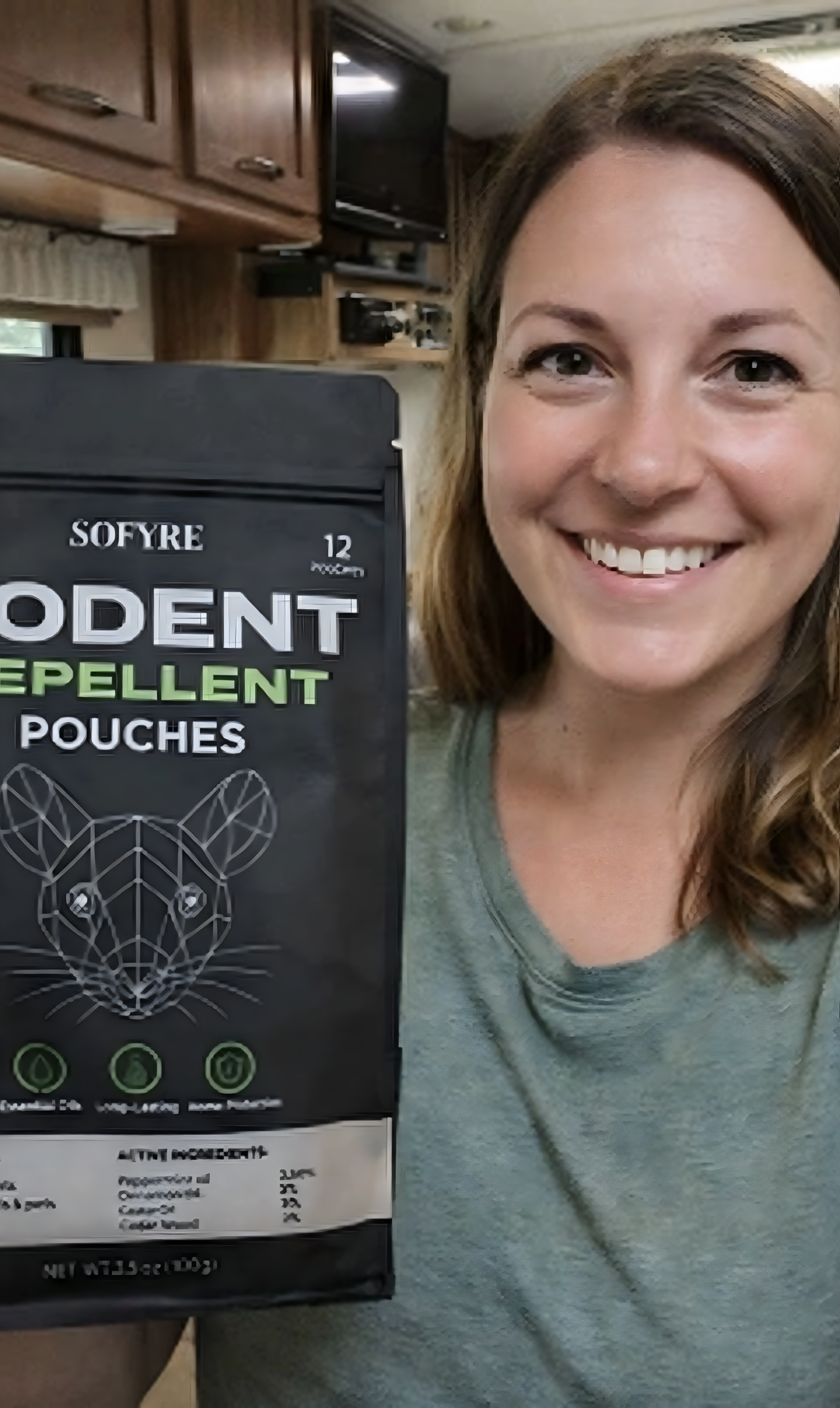 person holding SoFyre Mouse Repellent